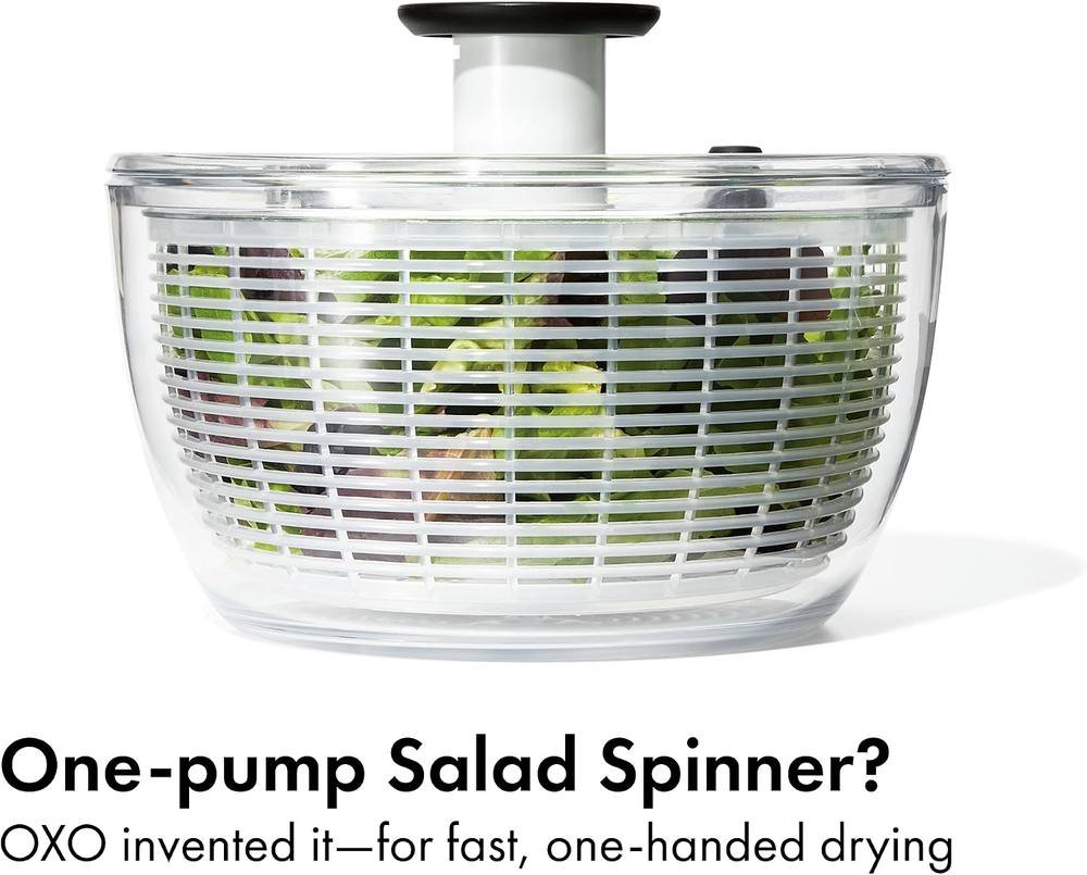 XO one-pump salad spinner with fresh lettuce leaves inside clear bowl