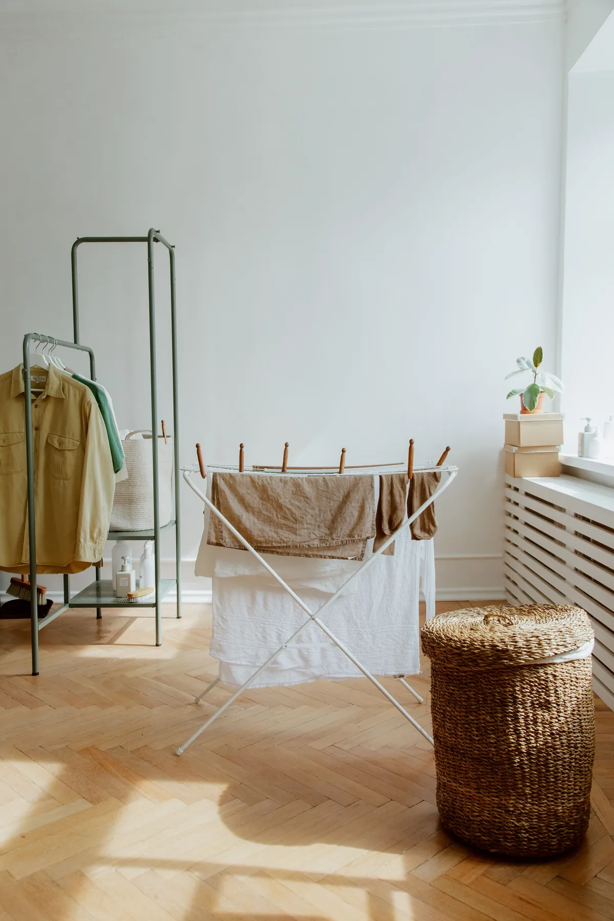 Clothes drying in an organized laundry room