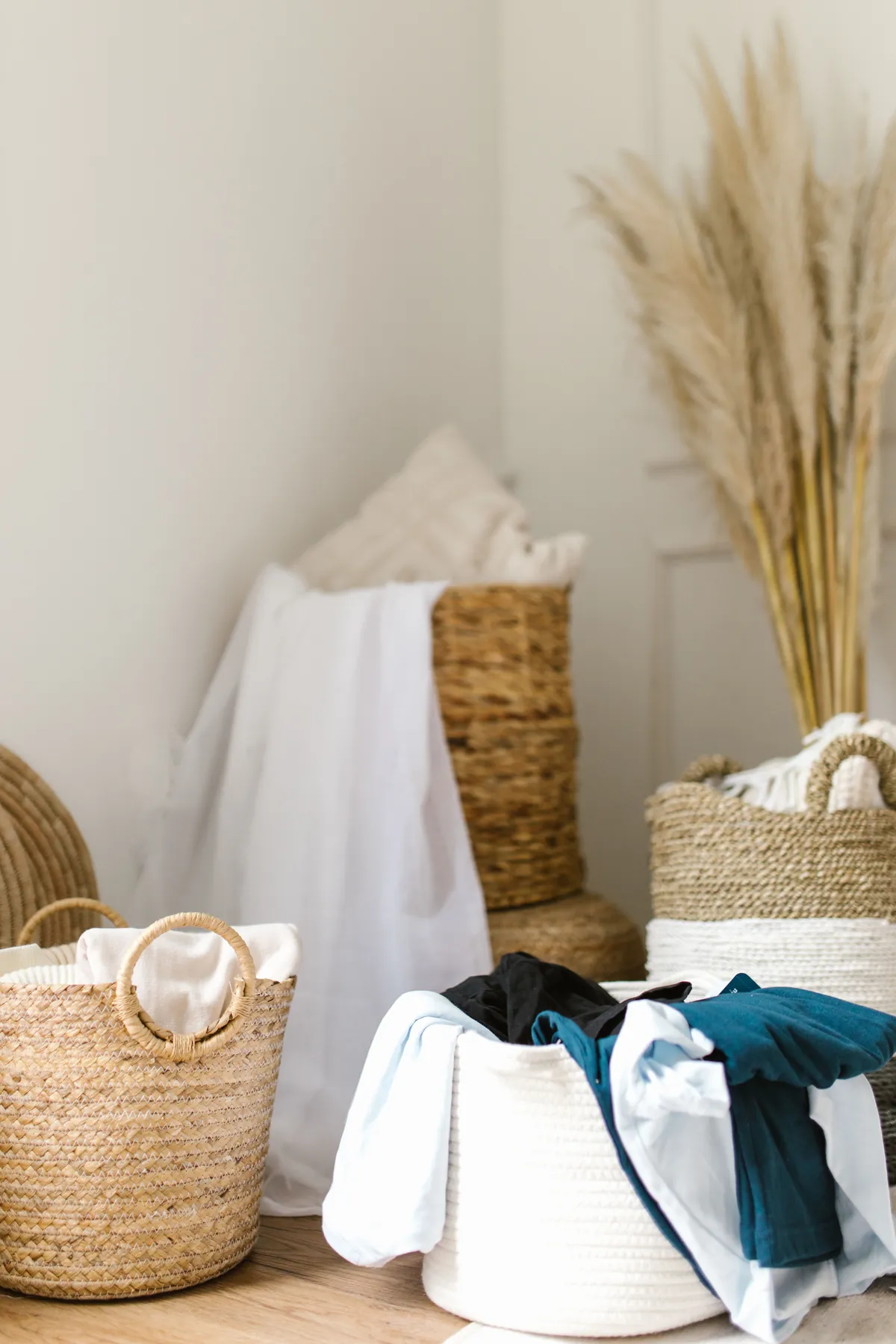 Woven laundry baskets for small laundry room storage